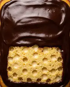 Boston Cream Poke Cake With Rich Ganache Topping